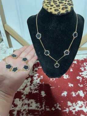 Gold Tone Necklace and Bracelet Set with Black Clover Motifs